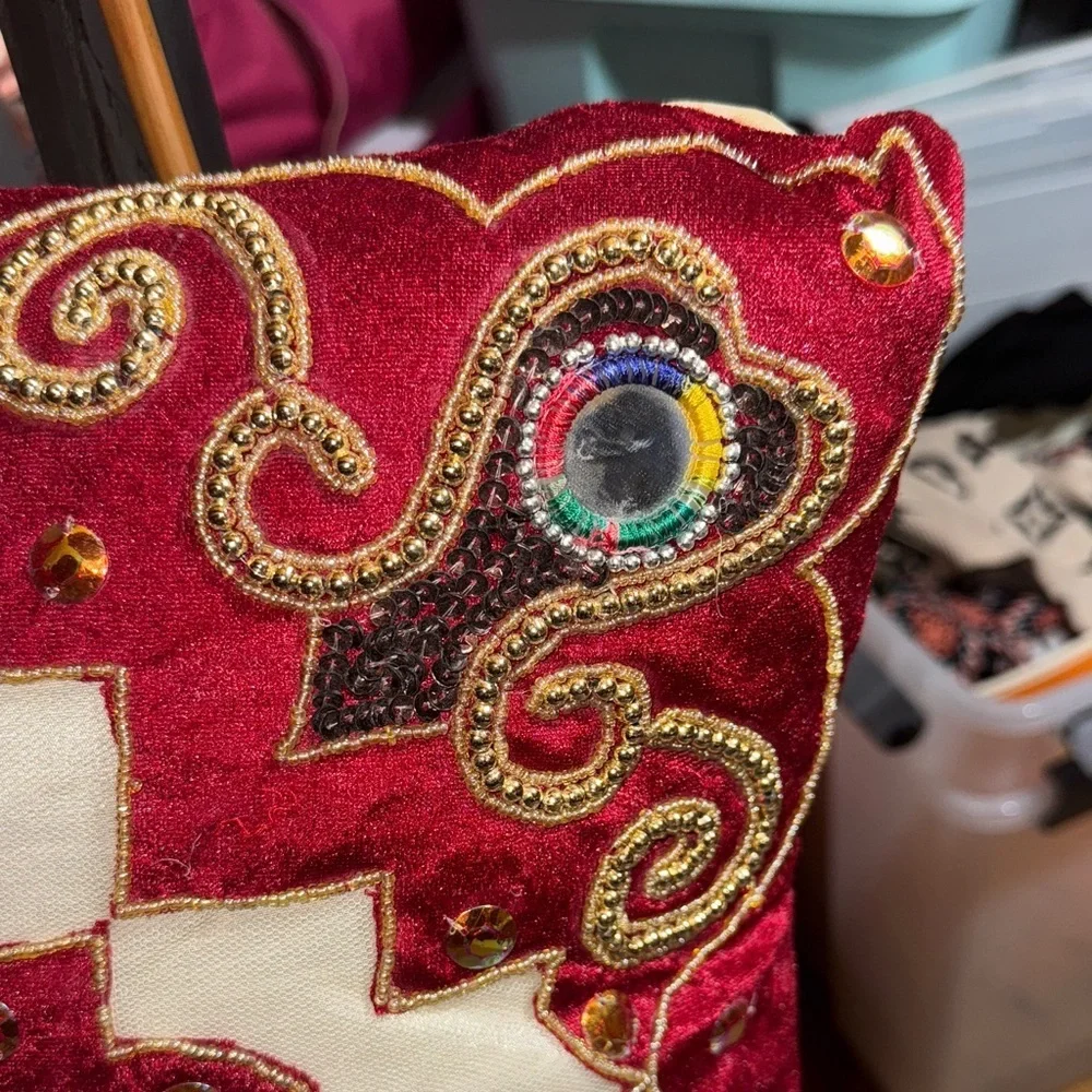 Elegant Red and White Embroidered Cushion